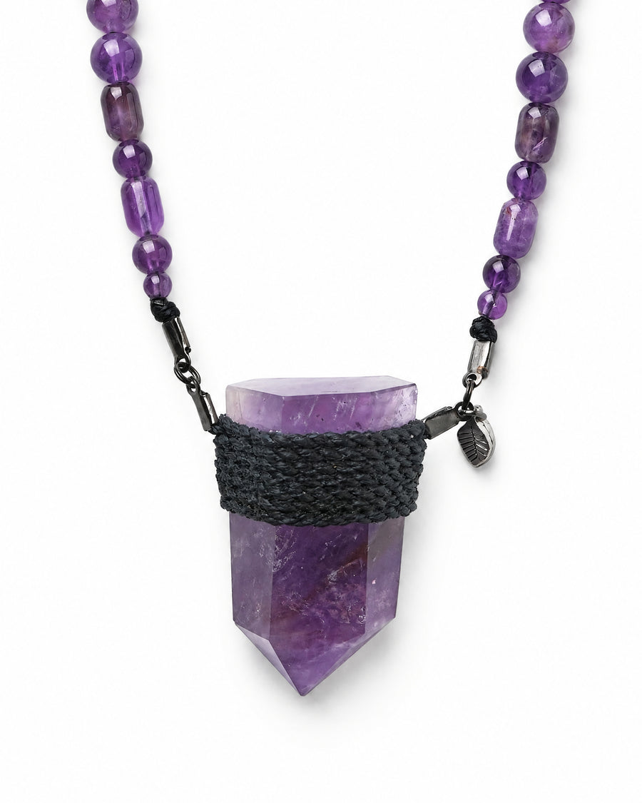 Amethyst Wrap Necklace No. 001 by Clink: polished amethyst point wrapped in black cord, close up