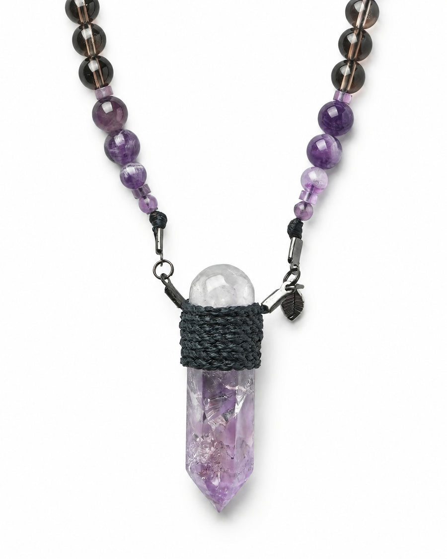 Amethyst Wrap Necklace No. 002 by Clink: polished amethyst point wrapped in black cord, close up