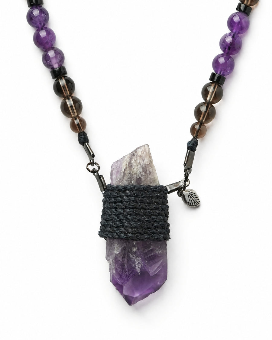 Cathedral Amethyst Wrap Necklace No. 003 by Clink: raw cathedral amethyst point wrapped in black cord, close up