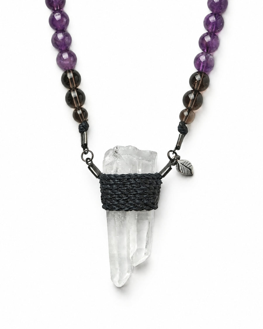 Clear Quartz Wrap Necklace No. 006 by Clink: raw clear quartz point wrapped in black cord, close up