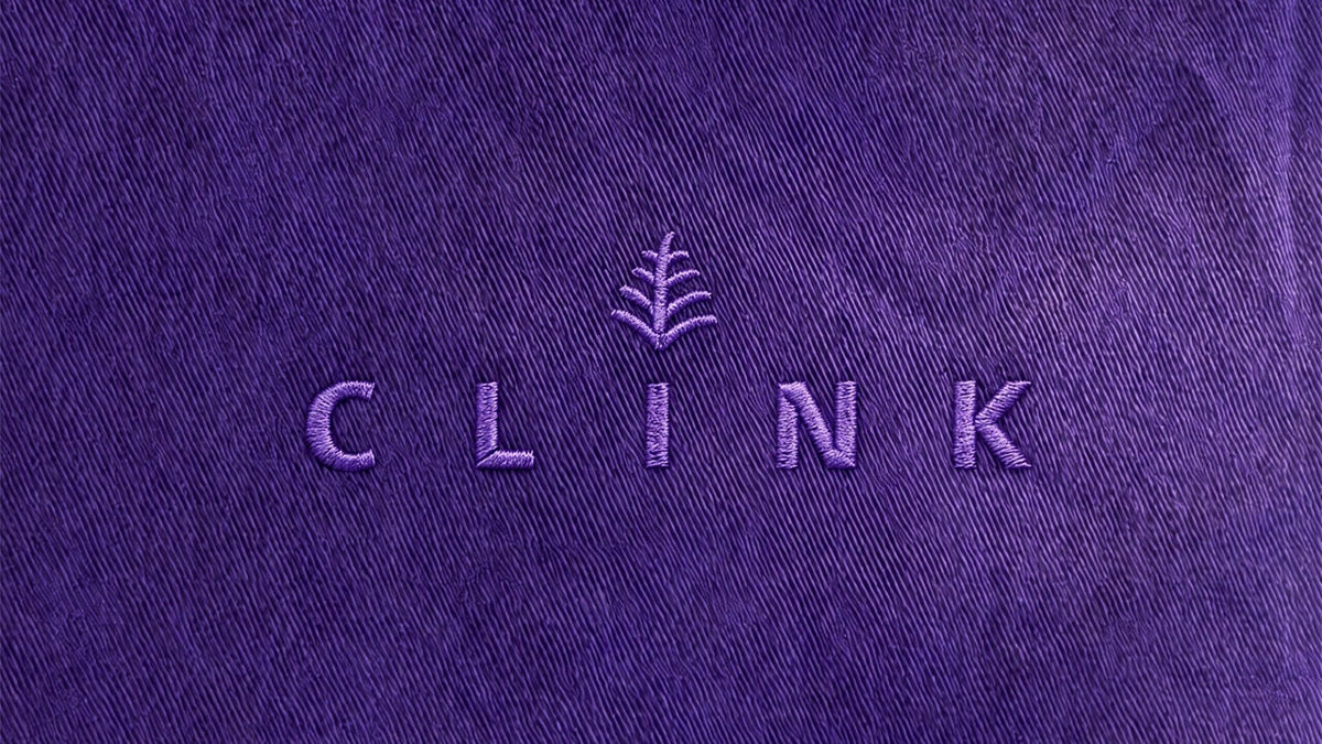 The Clink mark pressed into purple cloth