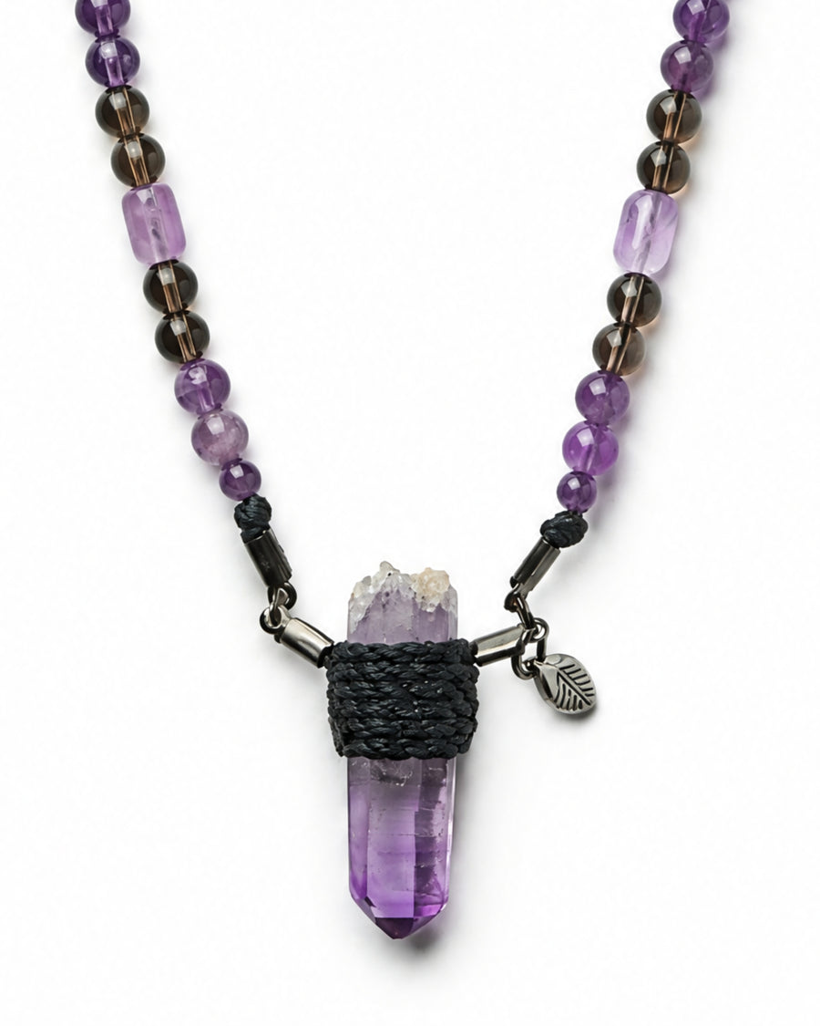 Vera Cruz Amethyst Wrap Necklace No. 004 by Clink: raw Vera Cruz amethyst point wrapped in black cord, close up